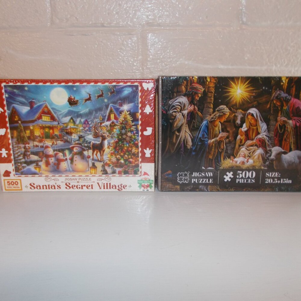 Two 500 piece jigsaw puzzles:  Santa's Secret Village & a Nativity scene, new
